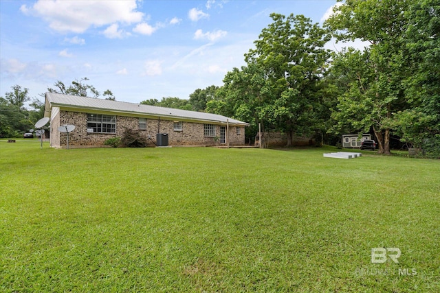814 Taylor St, Bay Minette, AL 36507 - view of green lawn featuring a shed