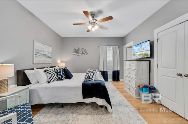 5781 State Highway 180 Unit 5003, Gulf Shores, AL 36542 - bedroom featuring ceiling fan and light wood-type flooring