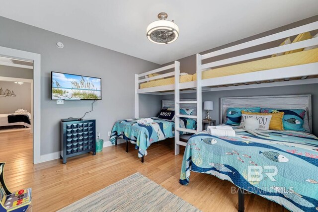 5781 State Highway 180 Unit 5003, Gulf Shores, AL 36542 - bedroom with wood finished floors and baseboards