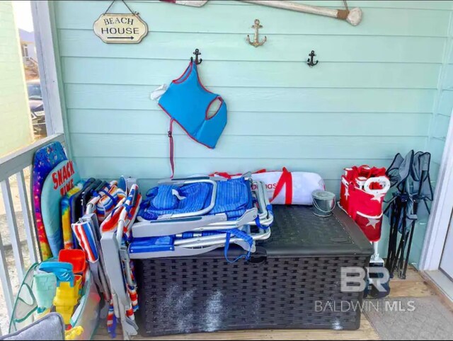 5781 State Highway 180 Unit 5003, Gulf Shores, AL 36542 - exterior space featuring wooden walls and a healthy amount of sunlight