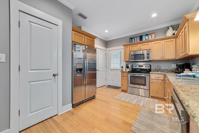 kitchen featuring light wood-type flooring, stainless steel appliances, sink, crown molding, and light stone counters