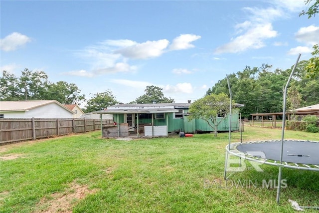 view of yard with a trampoline