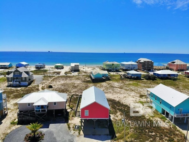 bird's eye view with a water view and a residential view