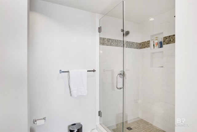 bathroom with a stall shower