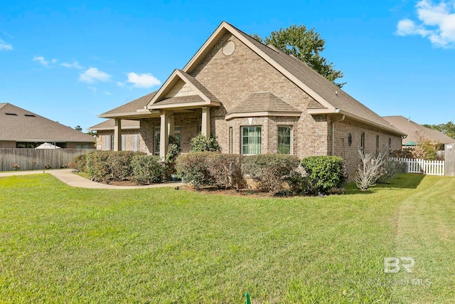 view of front of property with a front lawn