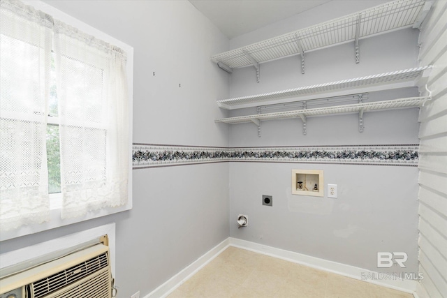 laundry room with washer hookup, baseboards, hookup for an electric dryer, and laundry area