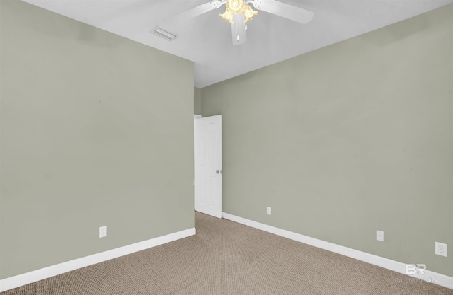 empty room featuring carpet and ceiling fan