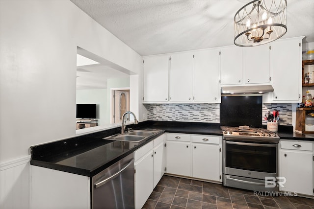 kitchen featuring appliances with stainless steel finishes, sink, and white cabinets