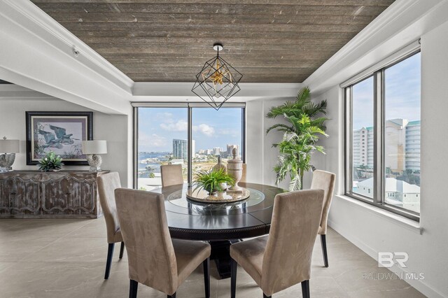 29235 Perdido Beach Blvd Unit 703, Orange Beach, AL 36561 - dining area with plenty of natural light, wood ceiling, a city view, a raised ceiling, and a chandelier