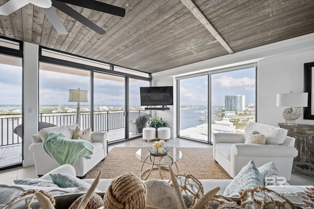 29235 Perdido Beach Blvd Unit 703, Orange Beach, AL 36561 - living room with floor to ceiling windows, a ceiling fan, wood ceiling, and tile patterned floors