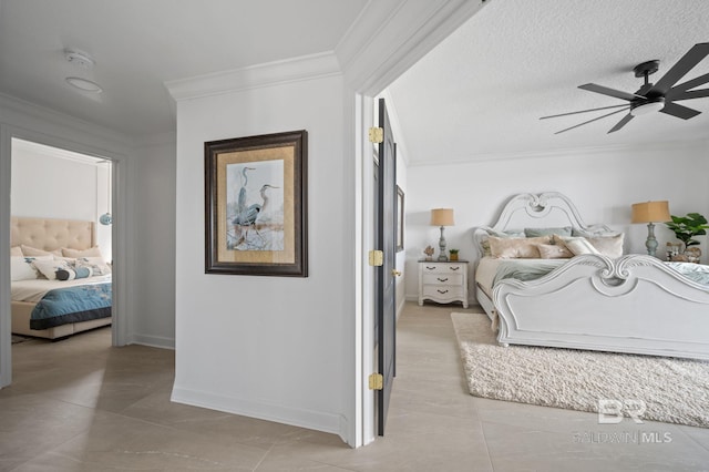 29235 Perdido Beach Blvd Unit 703, Orange Beach, AL 36561 - tiled bedroom with crown molding, baseboards, and a ceiling fan