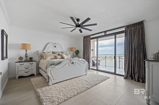 bedroom with access to exterior, floor to ceiling windows, ornamental molding, a textured ceiling, and ceiling fan