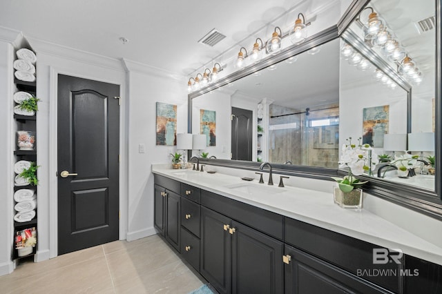 bathroom featuring crown molding, tile patterned flooring, vanity, and an enclosed shower