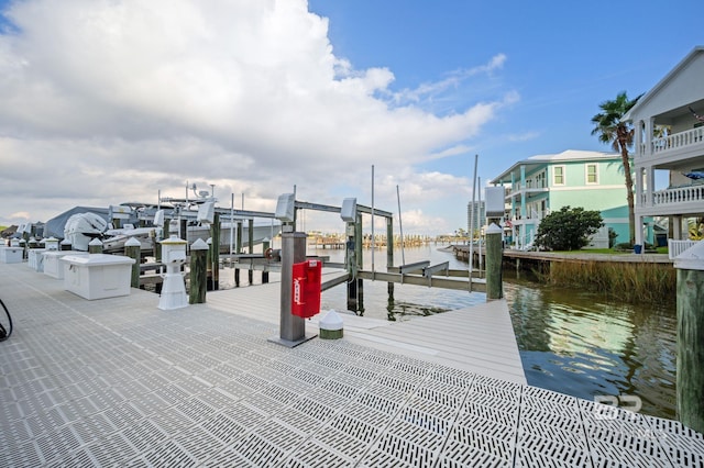 29235 Perdido Beach Blvd Unit 703, Orange Beach, AL 36561 - dock featuring boat lift and a water view