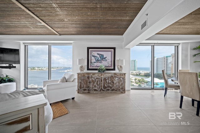 29235 Perdido Beach Blvd Unit 703, Orange Beach, AL 36561 - living area featuring a water view, wood ceiling, expansive windows, and crown molding