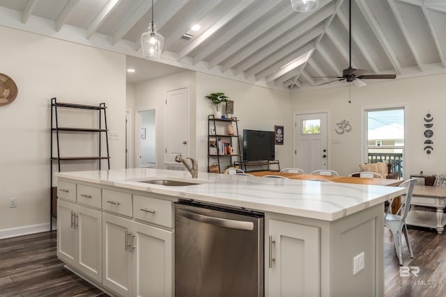 kitchen featuring a center island with sink, white cabinets, light stone counters, stainless steel dishwasher, and a sink