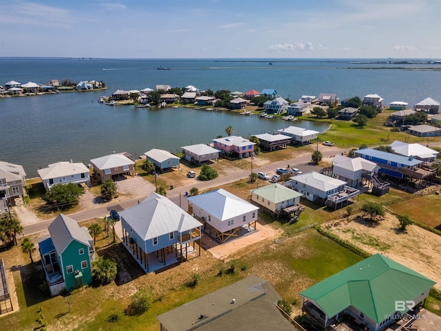 bird's eye view with a water view and a residential view