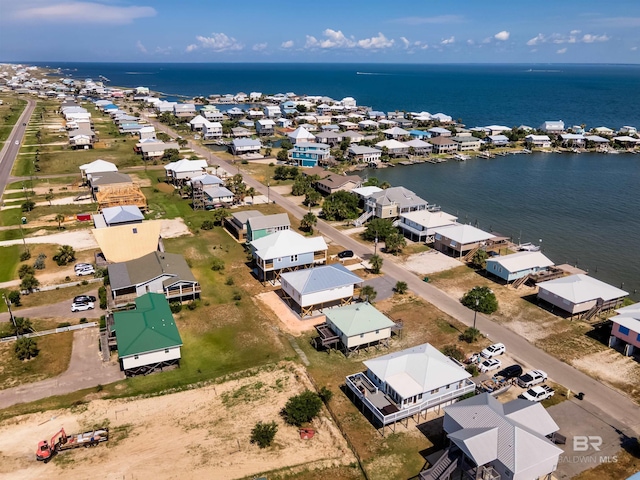 bird's eye view featuring a residential view and a water view