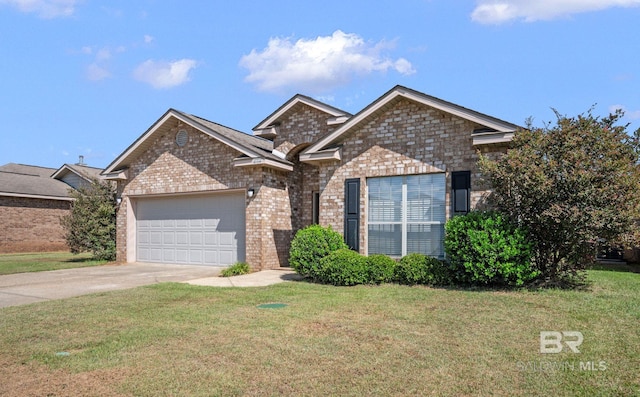 view of front of house featuring a front lawn and a garage