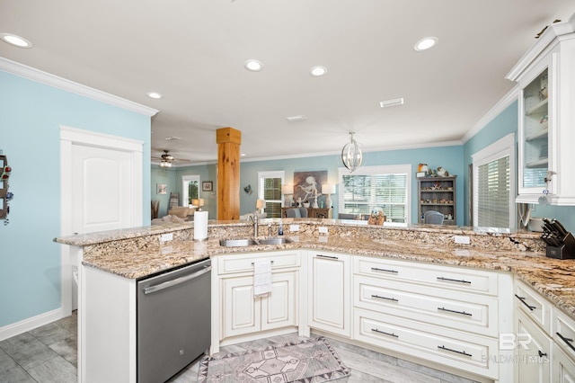 kitchen with dishwasher, kitchen peninsula, sink, and crown molding