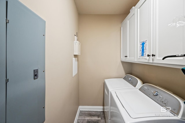 laundry room with cabinets and washer and dryer