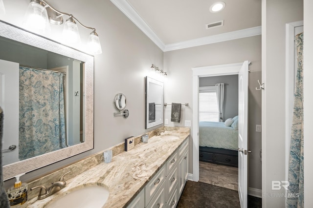 bathroom featuring wood-type flooring, crown molding, and vanity