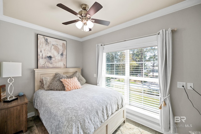 bedroom with ornamental molding, ceiling fan, and dark hardwood / wood-style floors