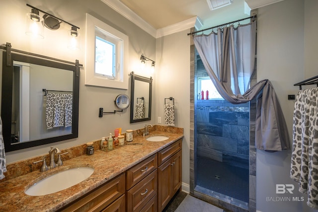 bathroom with walk in shower, vanity, and crown molding