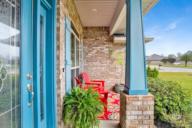 property entrance with covered porch