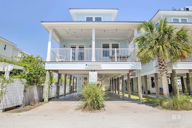 coastal home featuring a carport