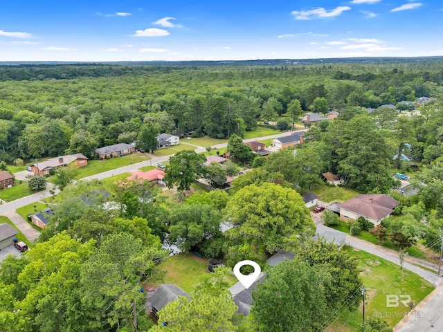224 Cache Cir, Chickasaw, AL 36611 - aerial view of residential area with a heavily wooded area