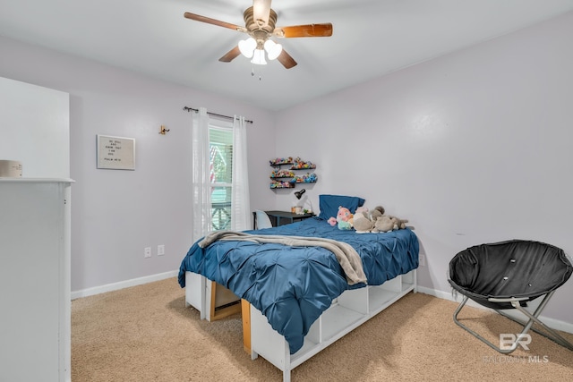 224 Cache Cir, Chickasaw, AL 36611 - carpeted bedroom featuring baseboards and ceiling fan
