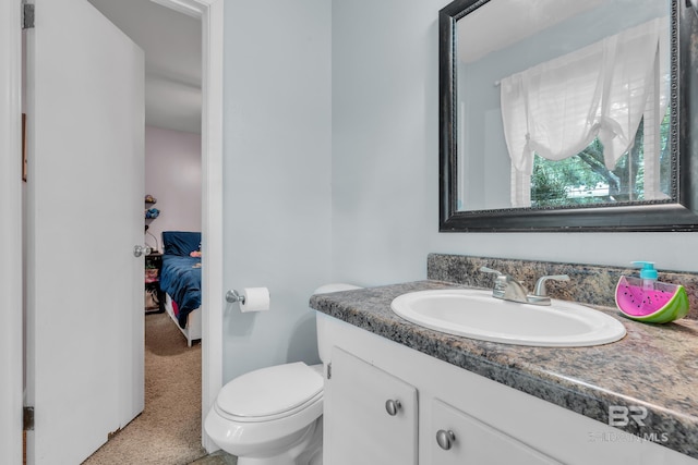 224 Cache Cir, Chickasaw, AL 36611 - bathroom featuring vanity, toilet, and ensuite bath
