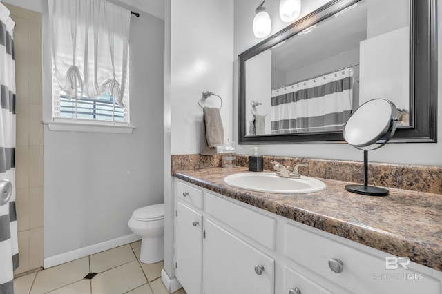 224 Cache Cir, Chickasaw, AL 36611 - bathroom featuring toilet, vanity, tile patterned flooring, baseboards, and curtained shower