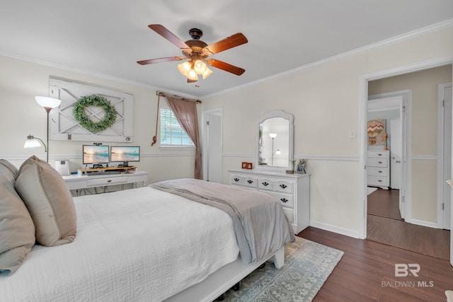 224 Cache Cir, Chickasaw, AL 36611 - bedroom with ornamental molding, dark wood finished floors, baseboards, and a ceiling fan