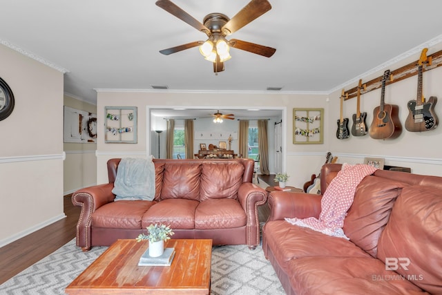 224 Cache Cir, Chickasaw, AL 36611 - living room featuring ceiling fan, ornamental molding, and wood finished floors