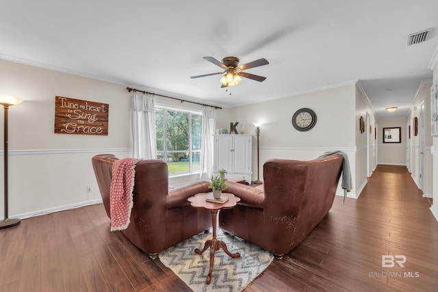 224 Cache Cir, Chickasaw, AL 36611 - living area with ceiling fan, crown molding, wood finished floors, and baseboards