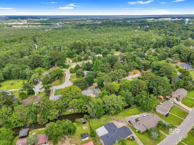 224 Cache Cir, Chickasaw, AL 36611 - aerial view of property's location with a forest and nearby suburban area