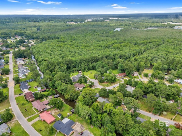 224 Cache Cir, Chickasaw, AL 36611 - aerial view of property's location featuring a forest and nearby suburban area