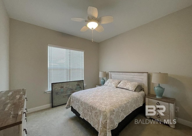 4844 E Cypress Loop, Orange Beach, AL 36561 - bedroom featuring baseboards, light carpet, and ceiling fan