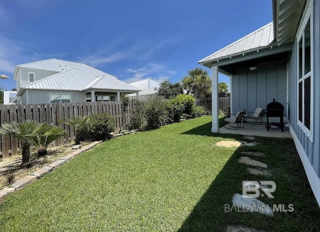 4844 E Cypress Loop, Orange Beach, AL 36561 - view of yard with a patio