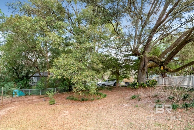 view of yard featuring fence