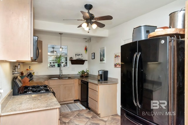 kitchen with ceiling fan, a sink, light brown cabinetry, black appliances, and pendant lighting