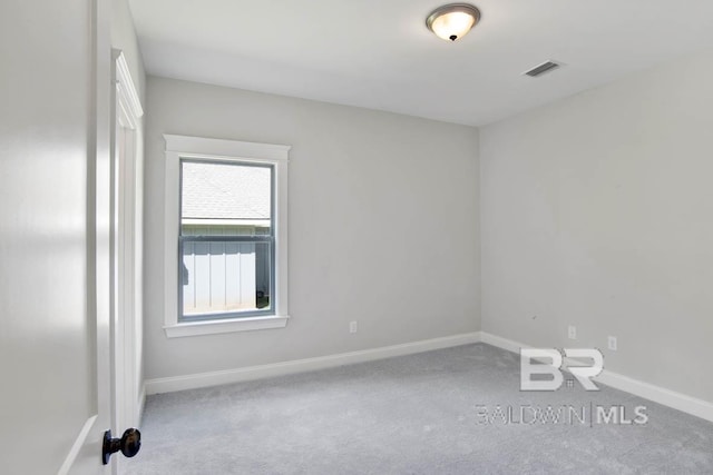 empty room featuring carpet flooring