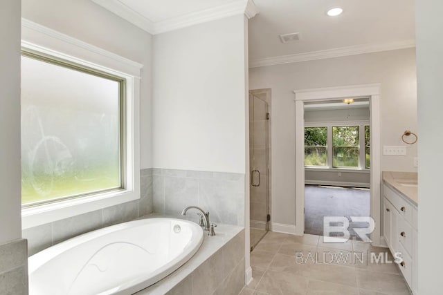 bathroom featuring tile patterned floors, vanity, shower with separate bathtub, and ornamental molding