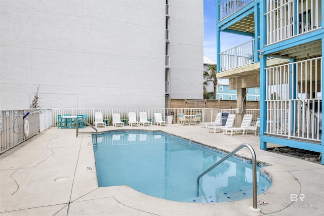 view of pool with a patio area