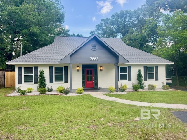 2663 Demetropolis Rd, Mobile, AL 36693 - view of front facade with roof with shingles and a porch