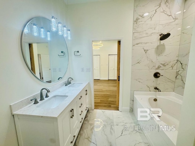 2663 Demetropolis Rd, Mobile, AL 36693 - full bathroom with marble finish floors, double vanity, and shower / bath combination