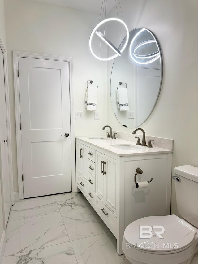 2663 Demetropolis Rd, Mobile, AL 36693 - bathroom featuring marble look tile flooring and double vanity