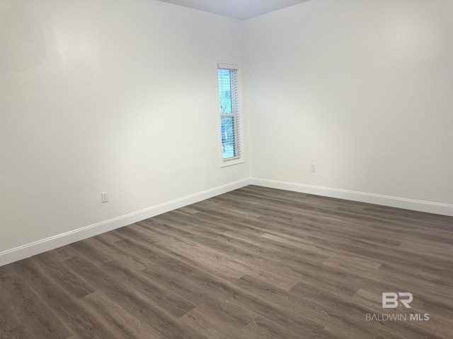 2663 Demetropolis Rd, Mobile, AL 36693 - unfurnished room featuring dark wood-style floors and baseboards